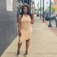 Sundress with polka-dot. Tan and white. 