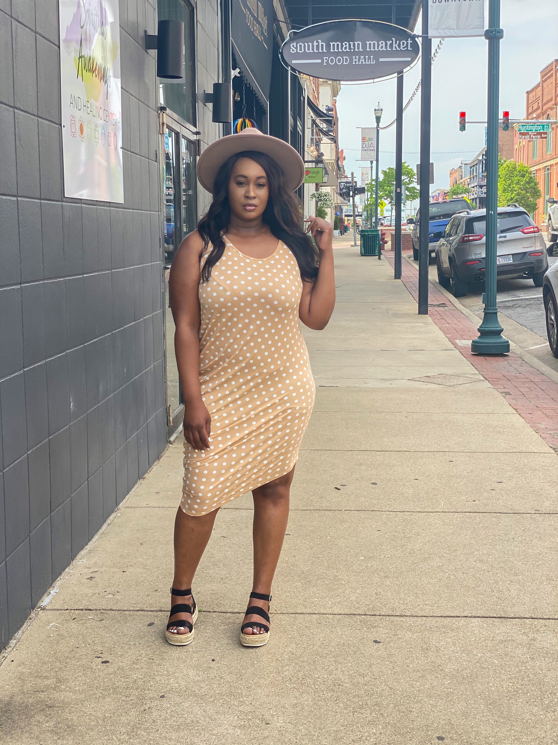 Sundress with polka-dot. Tan and white. 